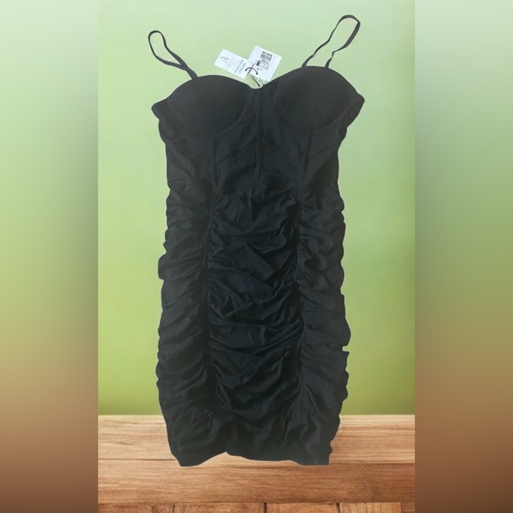 Black ruched dress w/adjustable spaghetti straps & semi sheer corset like bodice